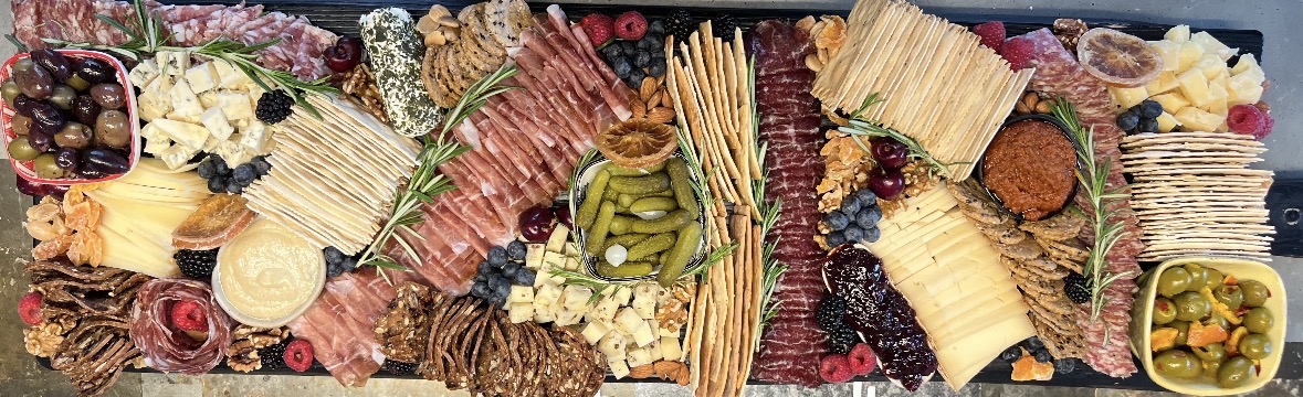 Large luxury grazing table with prosciutto, salami roses, artisan cheeses, crackers and fresh berries — Fireweed & Fig, Anchorage AK grazing catering